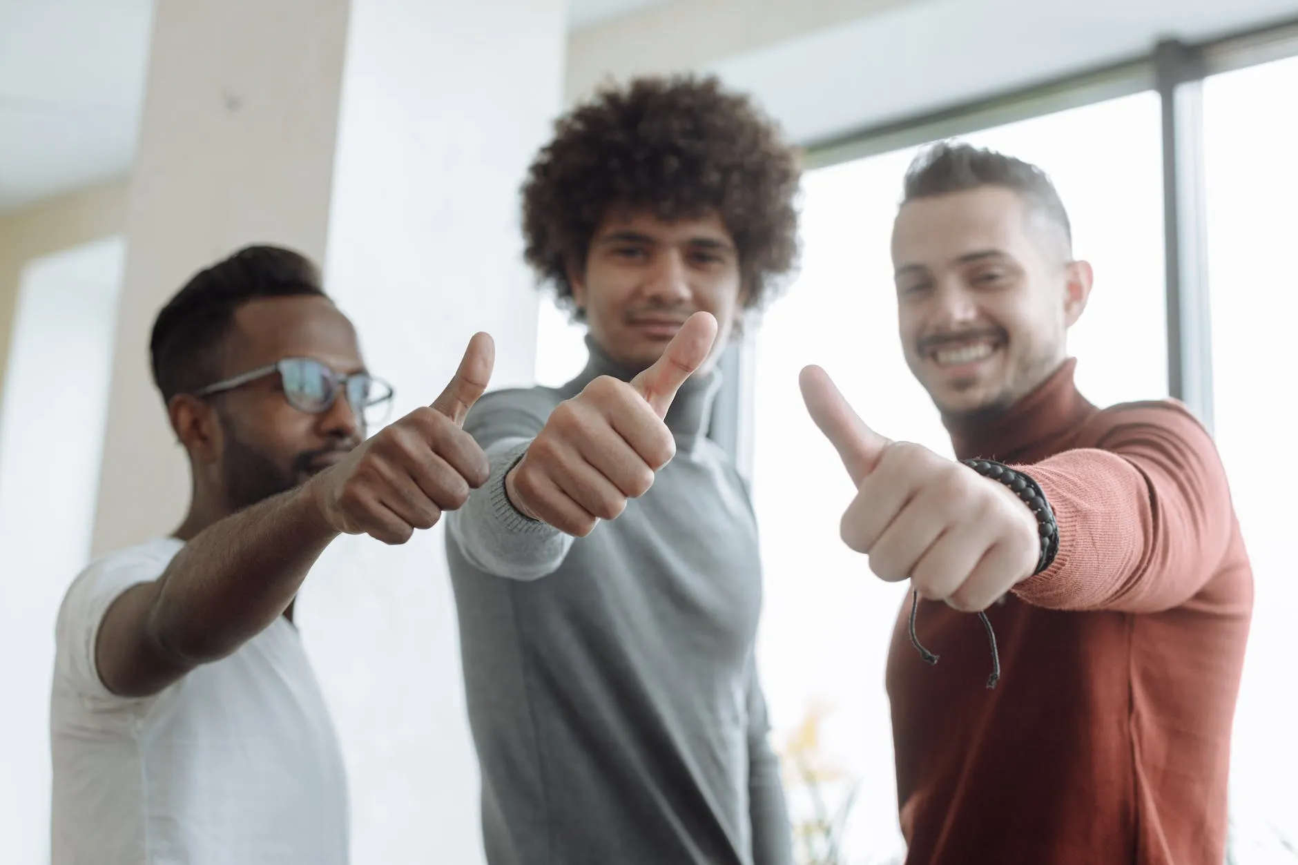 Top 5 cryptocurrency trends to expect in 2023 9 men putting a thumbs up