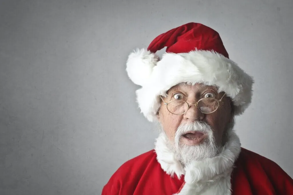 The Legend of St. Nicholas: Unraveling the Mystery of Santa Claus 8 man in santa claus costume
