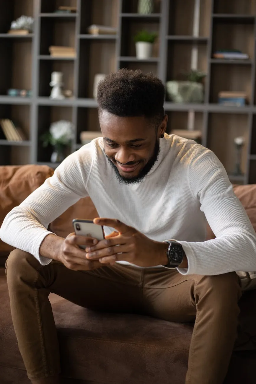 To Check 9mobile Data Balance In 2025 10 positive black man using smartphone to check data in 9mobile