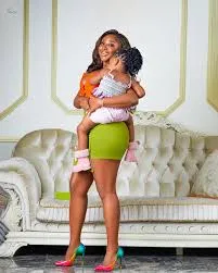 Ini Edo's Personal Projects and What to Expect from the Actor in 2025 2 Ini edo holding her daugther, Light