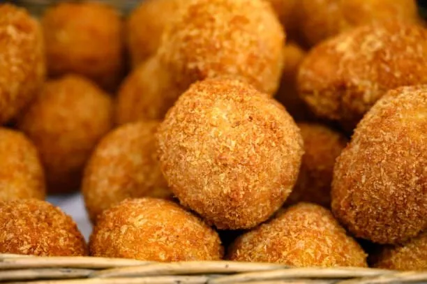How to Make Perfect Nigerian Puff Puff (Soft, Sweet & Golden) 2 A nice servin of Nigeran puff puff