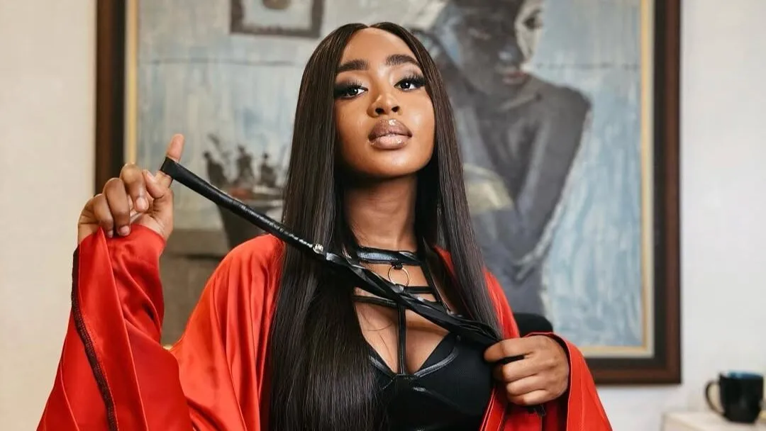 Deborah Felix Eloghosa in a dominatrix costume